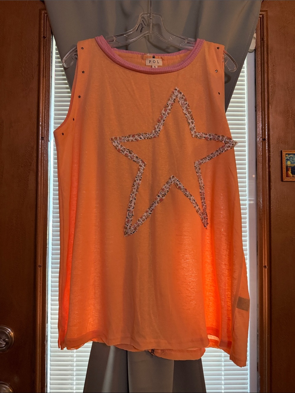 NWOT sleeveless top by POL, size small. Generous fit